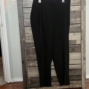 Black slacks (trousers)